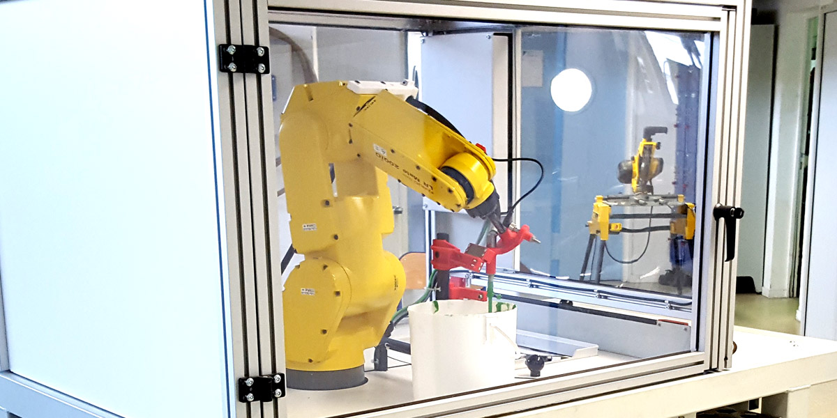 Cellule robotisée de graissage